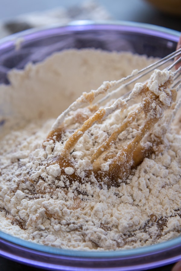 mixing bowl with whisk and ingredients