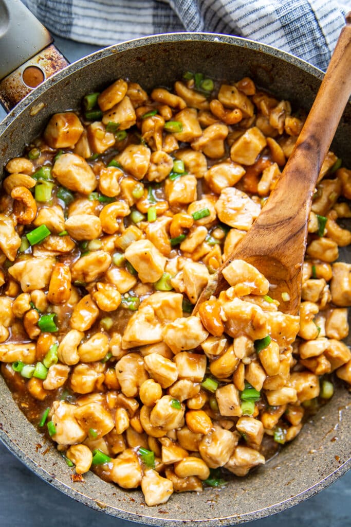 overhead shot of cooked cashew chicken in skillet