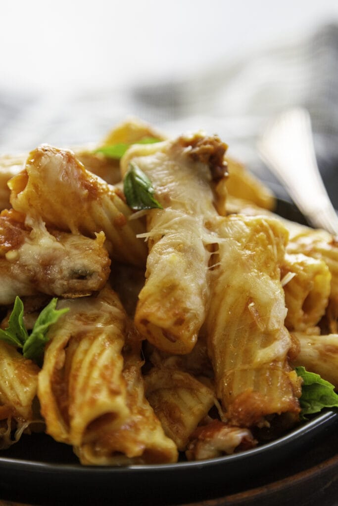 pasta with melted cheese on plate