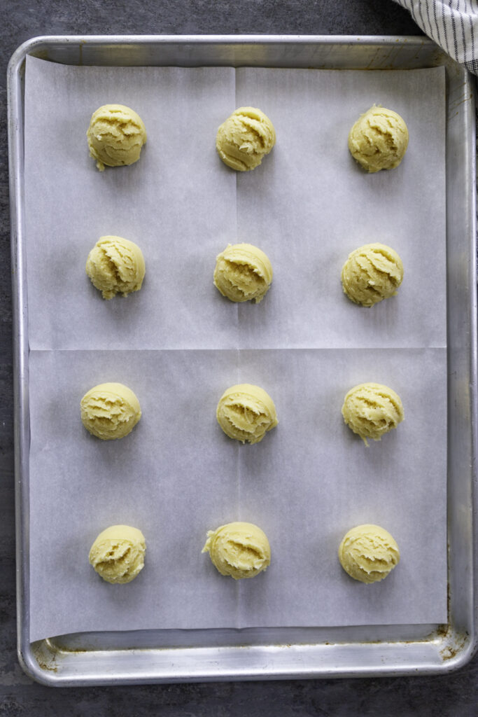 cookie sheet of 12 pieces of cookie dough