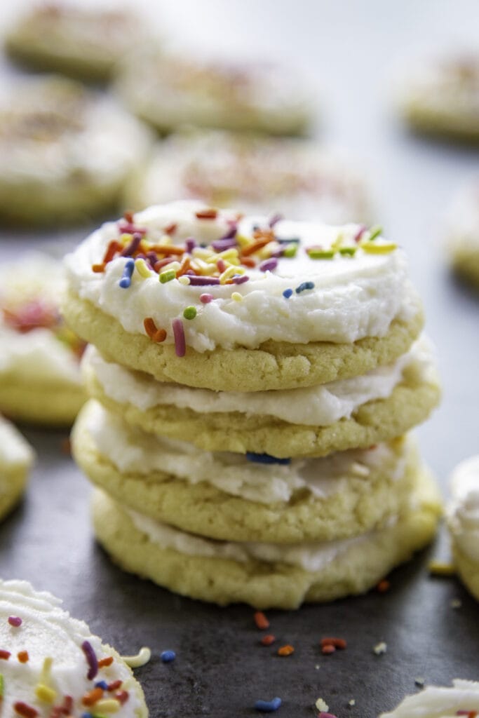 stack of sugar cookies with sprinkles