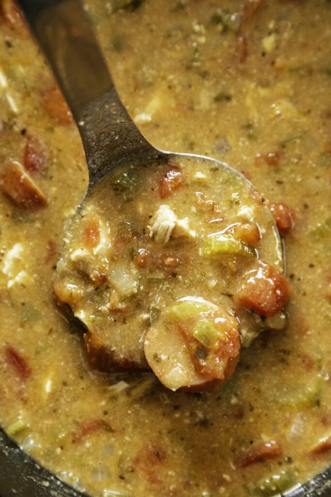 overhead shot of ladle with gumbo