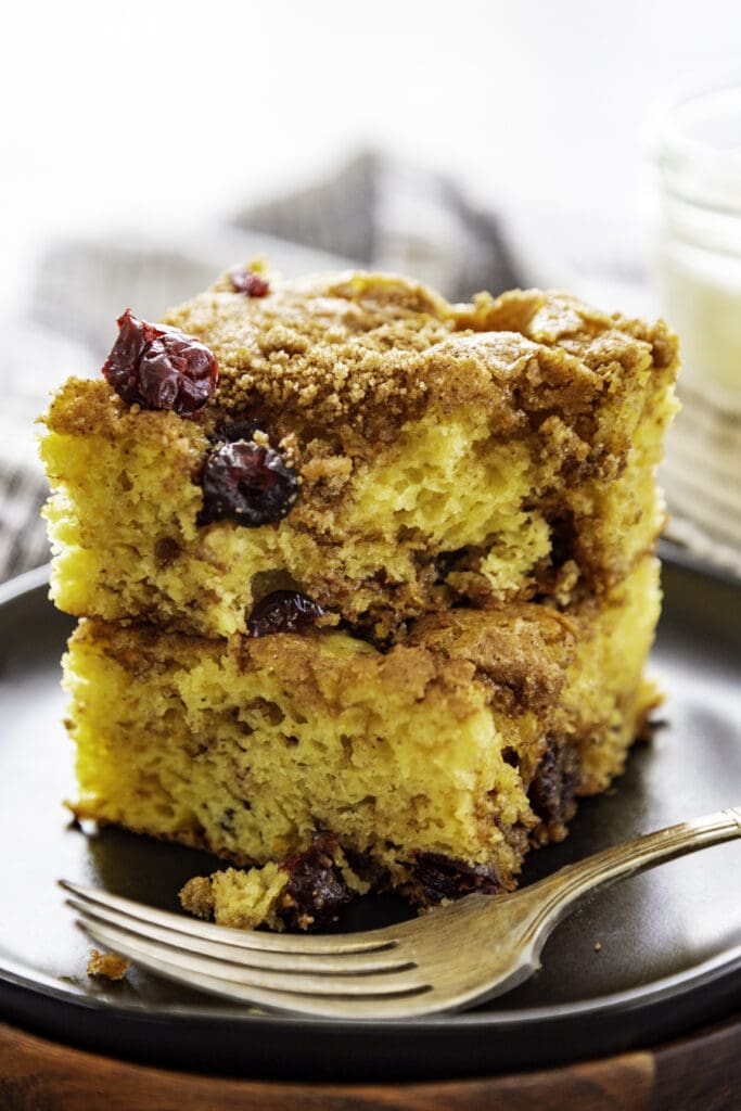 stack of cranberry orange coffee cake on plate