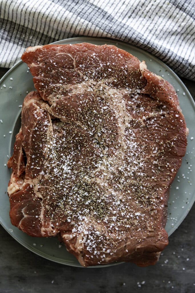 rare roast on plate with salt