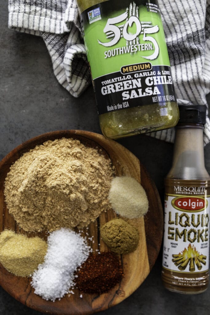 ingredient overhead shot with sesaonings, liquid smoke and green salsa