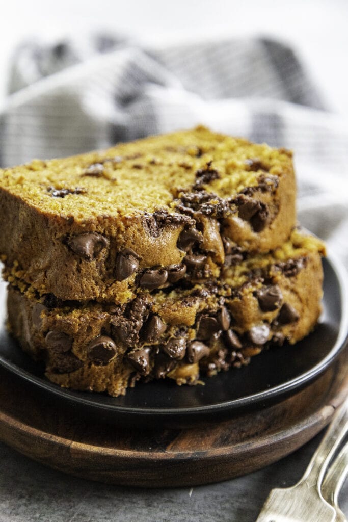 two slices of pumpkin chocolate chip bread on plate