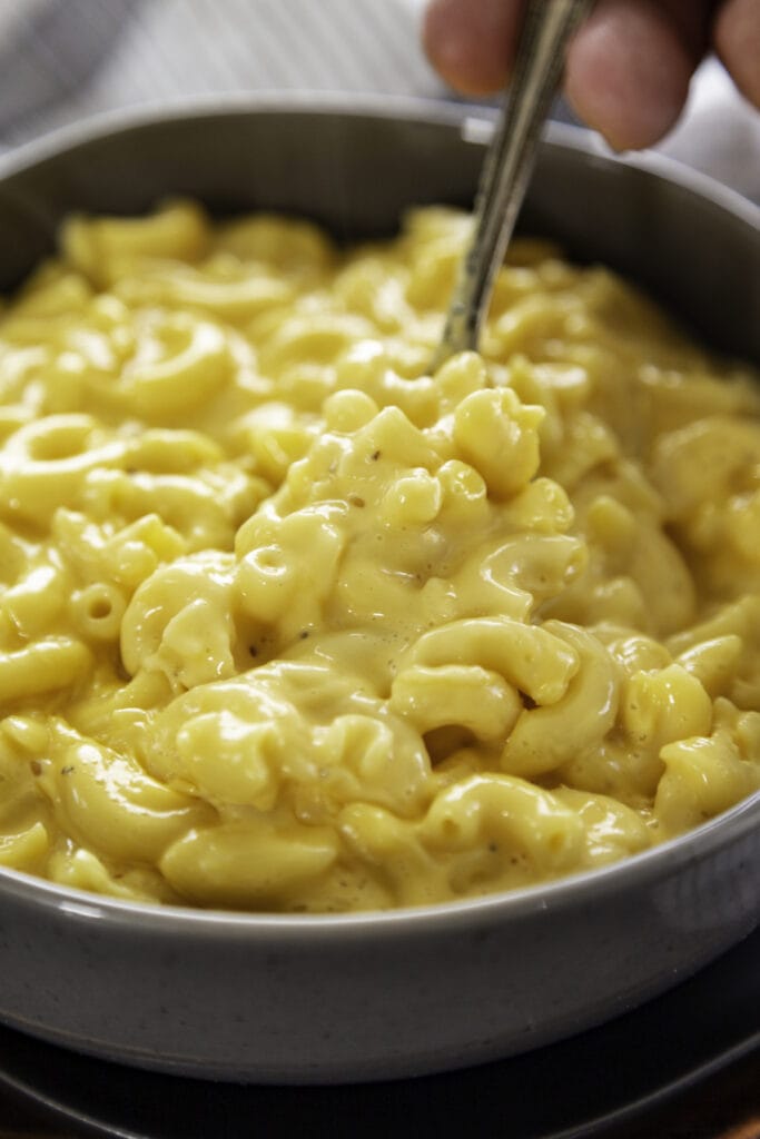 bowl of mac and cheese with spoon