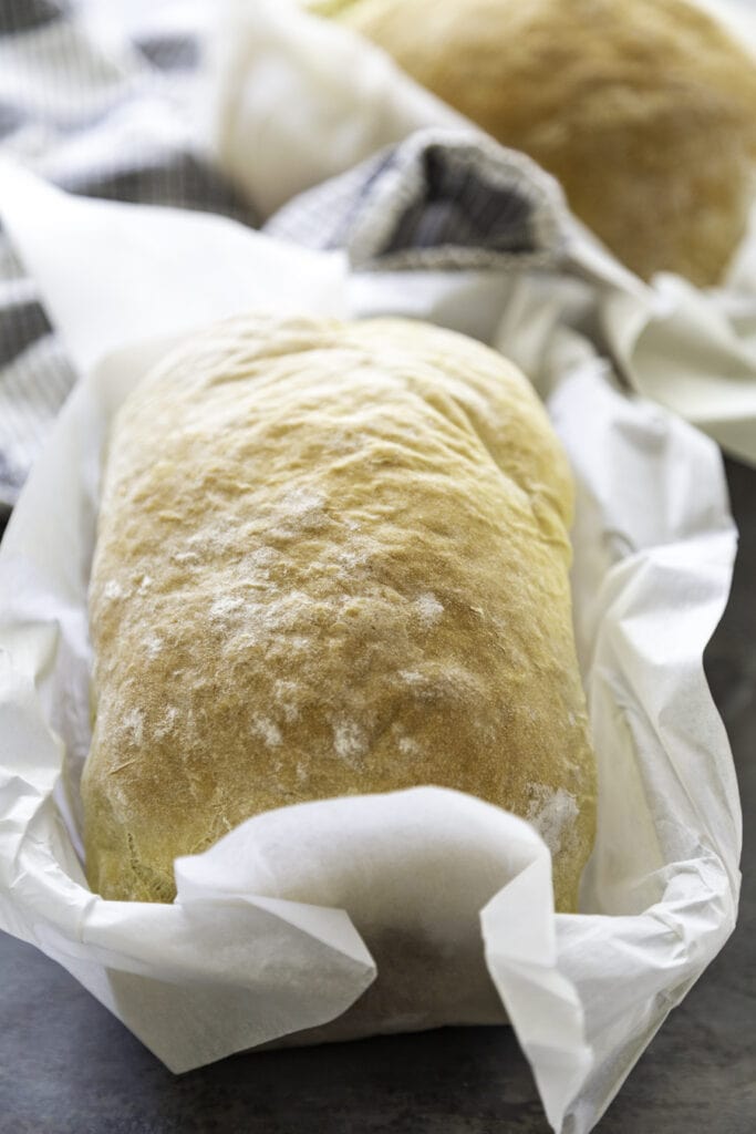 baked bread loaf in parchment paper