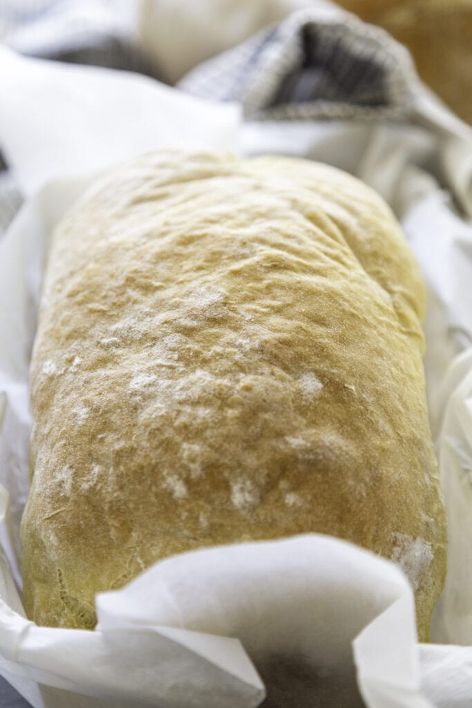 loaf of homemade bread in pan
