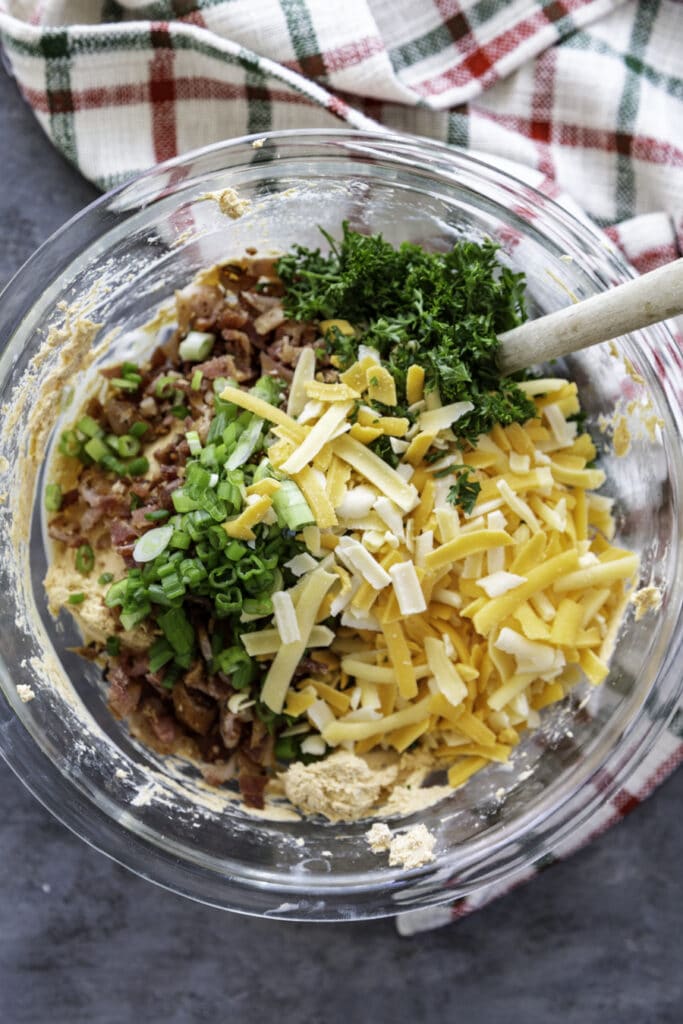 cream cheese with shredded cheese, green oinions, parsley and bacon