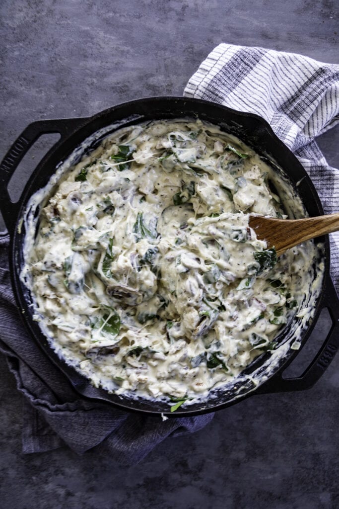 pasta dish in skillet before baked