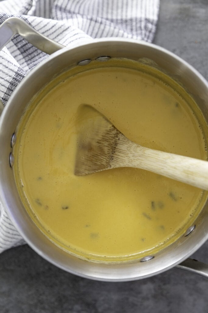 melted queso in pan
