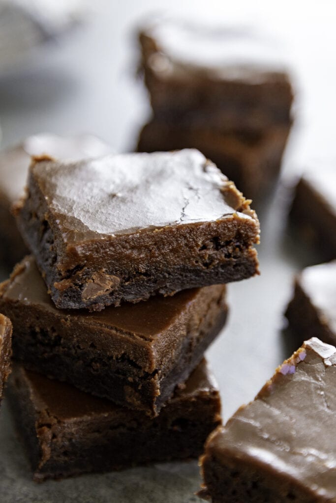 stack of frosted brownies