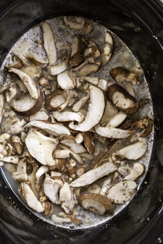 overhead shot of slow cooker with mushrooms