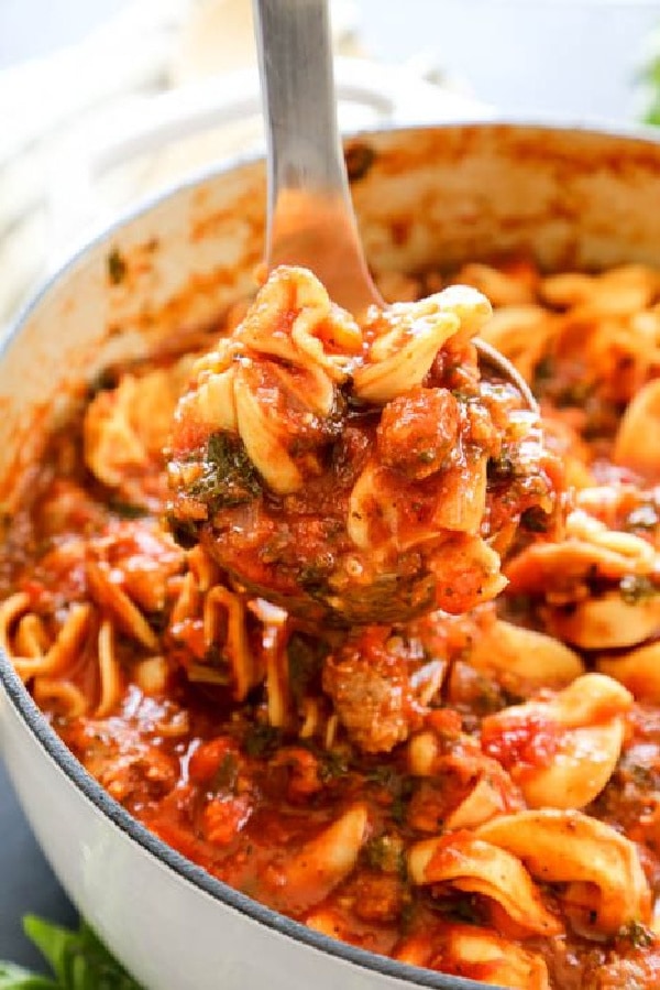ladle of tortellini soup