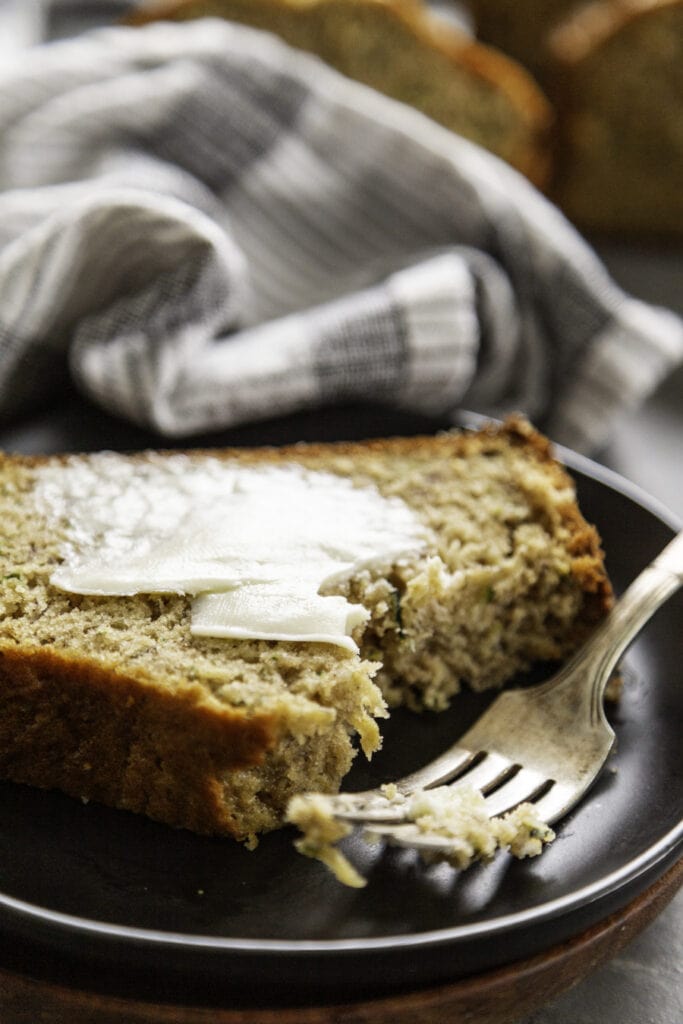 zucchini banana bread sliced on plate