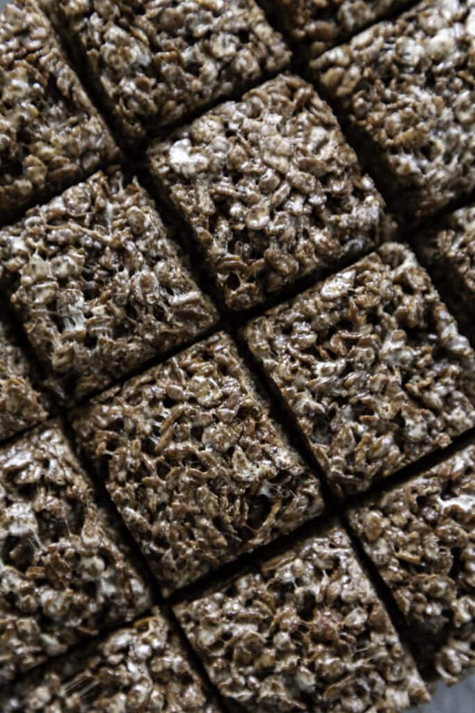 overhead shot of chocolate rice krispie treats sliced