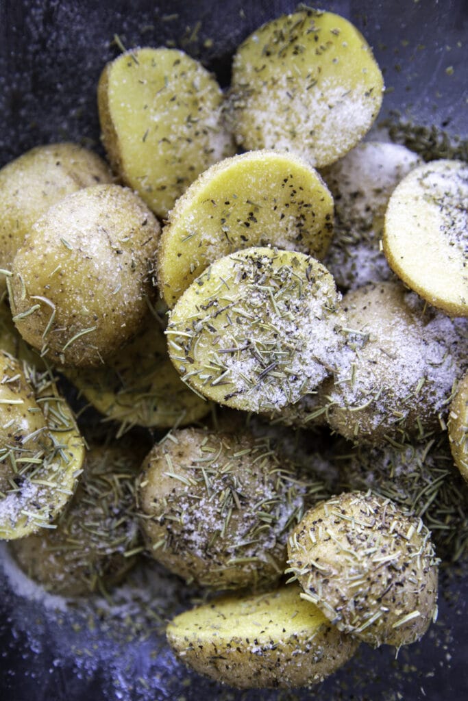 overhead shot of potatoes with oil and seasonings