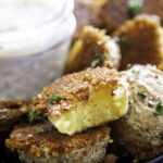 plate of potatoes with dip