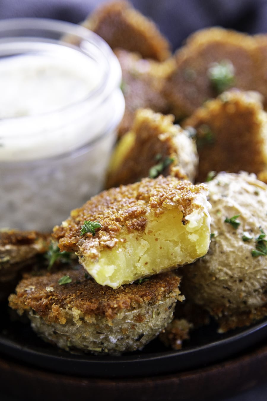 plate of potatoes with dip