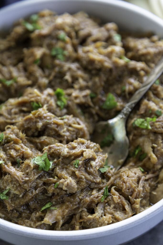 bowl of sweet pork with serving fork