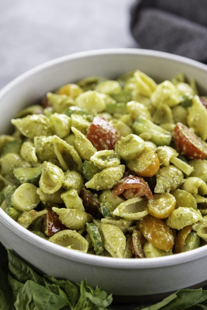 bowl of pesto pasta salad with vegetables