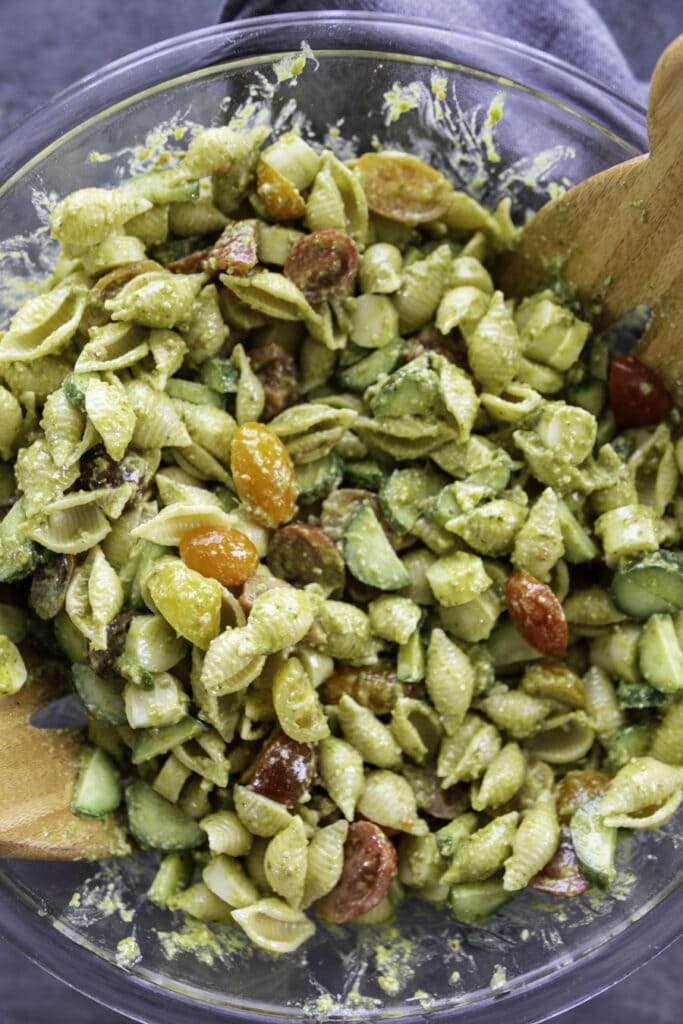 overhead shot of bowl with pesto pasta in it