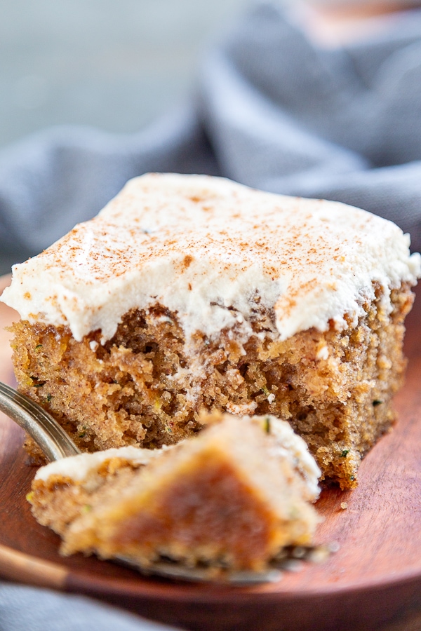 slice of zucchini cake with bite out of it