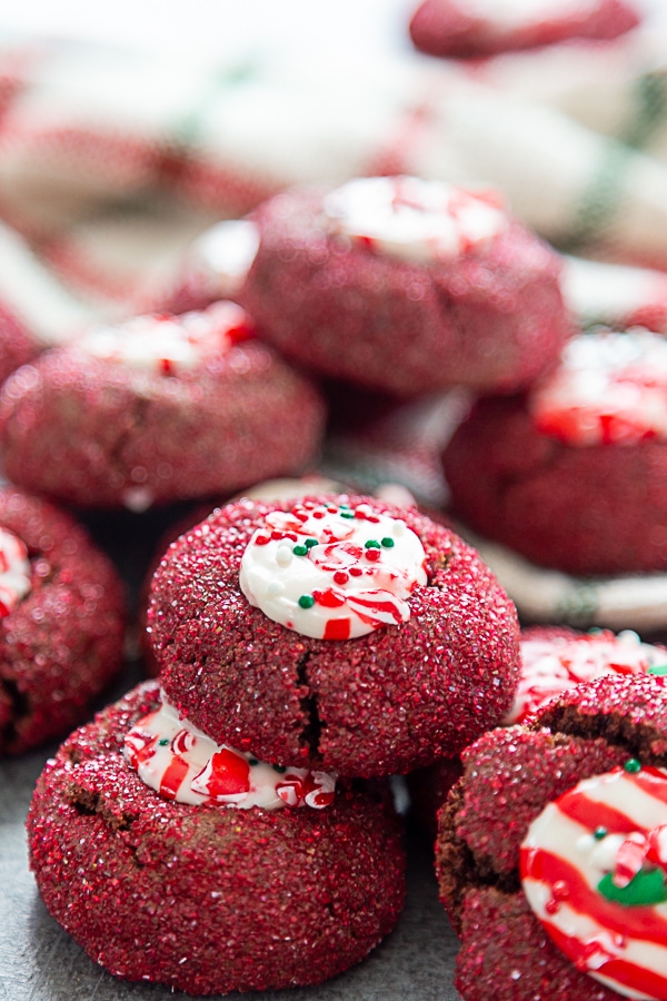 stack of chocolate peppermint kiss cookies with sprinkles