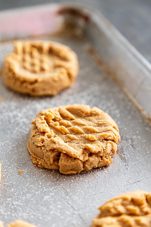 peanut butter cookies baked on cookie sheet