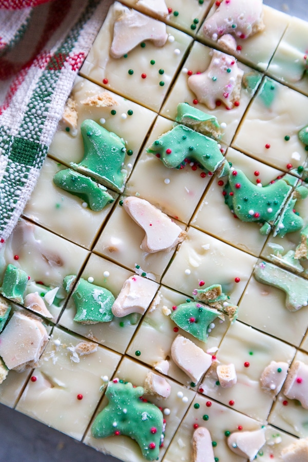 over the head shot of white chocolate Christmas cookie fudge cut into pieces