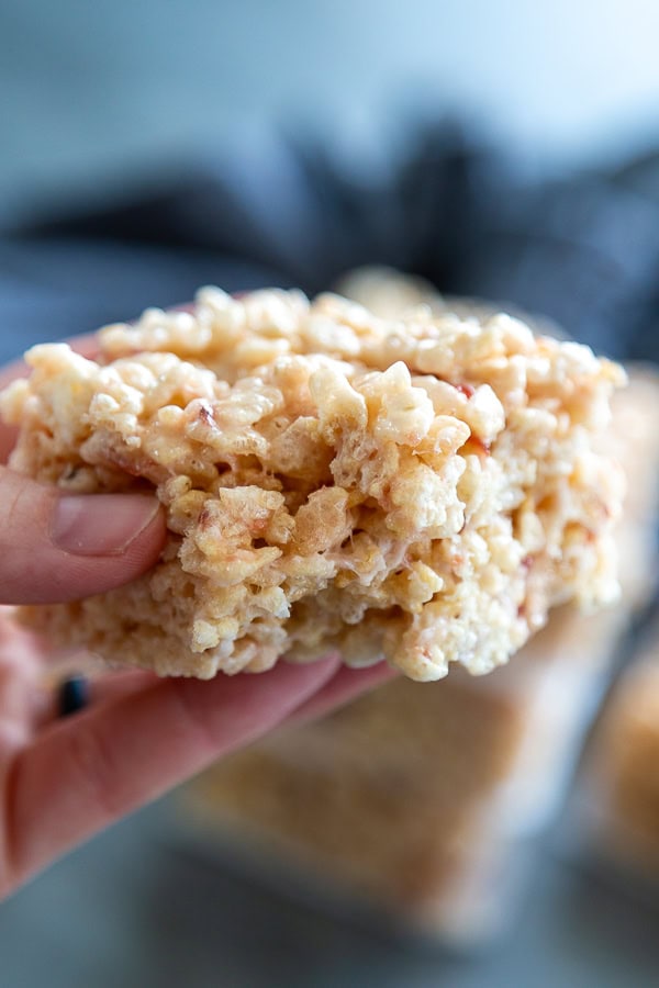 strawberry rice krispie treats with bite out of it