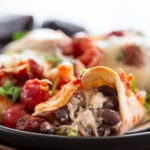plate of cherry enchiladas with bite