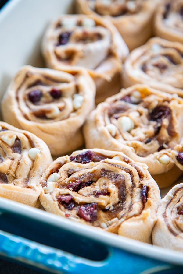 raw cinnamon rolls in pan