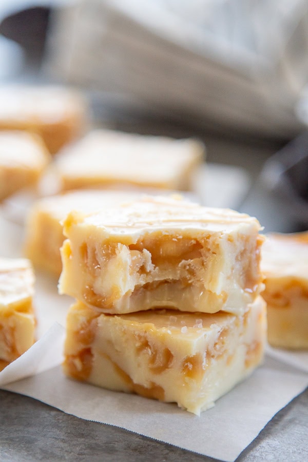 bite of a piece of white chocolate caramel fudge