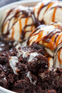 spoon with ice cream and brownies