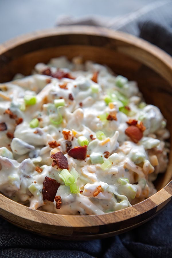 close up shot of bacon cheddar ranch dip in bowl