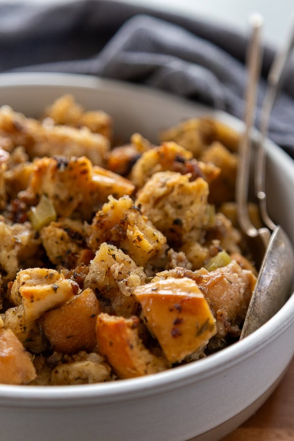 bowl of italian stuffing with serving spoon