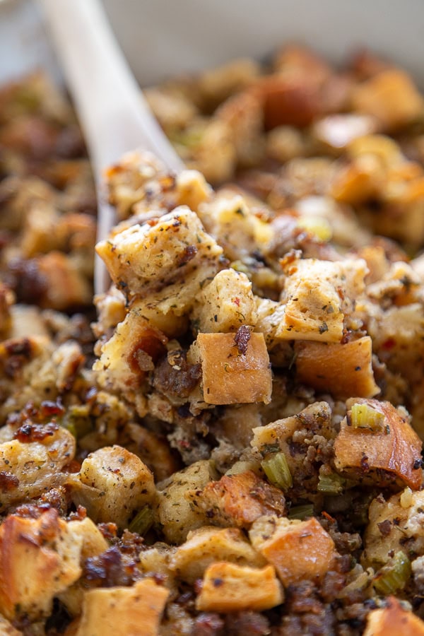 spoon full of Italian Stuffing in pan