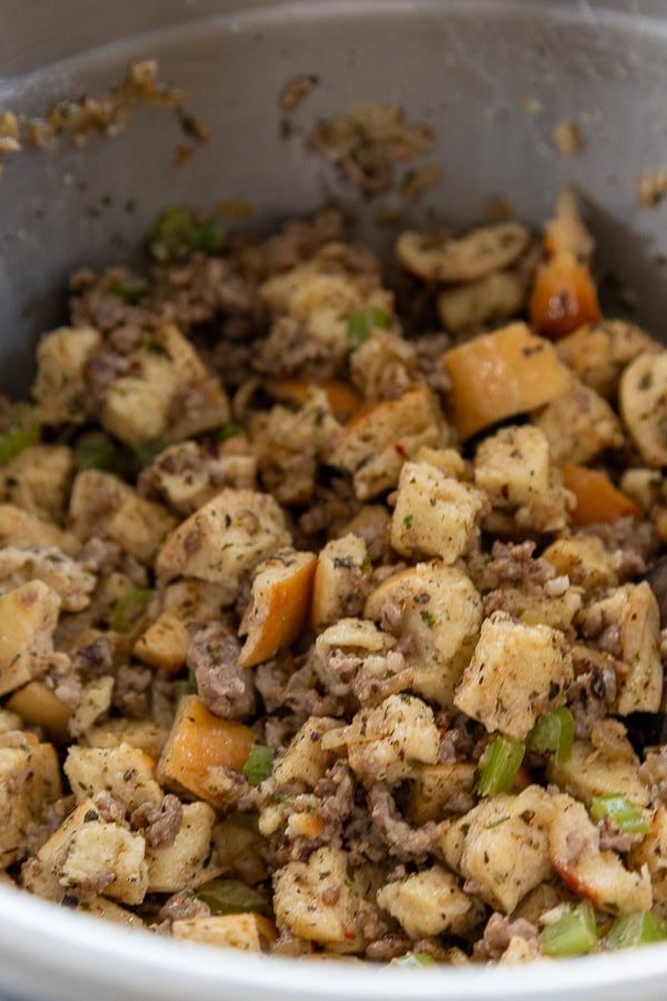 bowl of wet ingredients with bread for stuffing