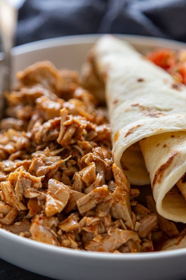 chicken and tortilla in bowl